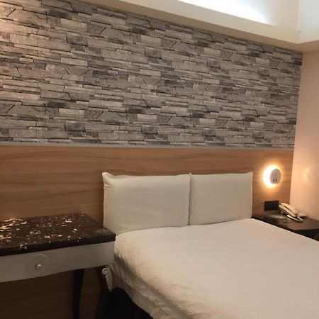 Ji Pin Hotel Синьчжуан Экстерьер фото